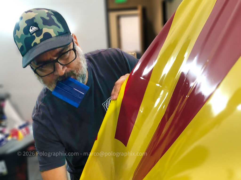 Leo of LD Wraps installing vinyl